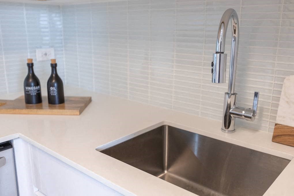 a kitchen with a sink and a faucet at The Kent, Chicago, IL, 60614