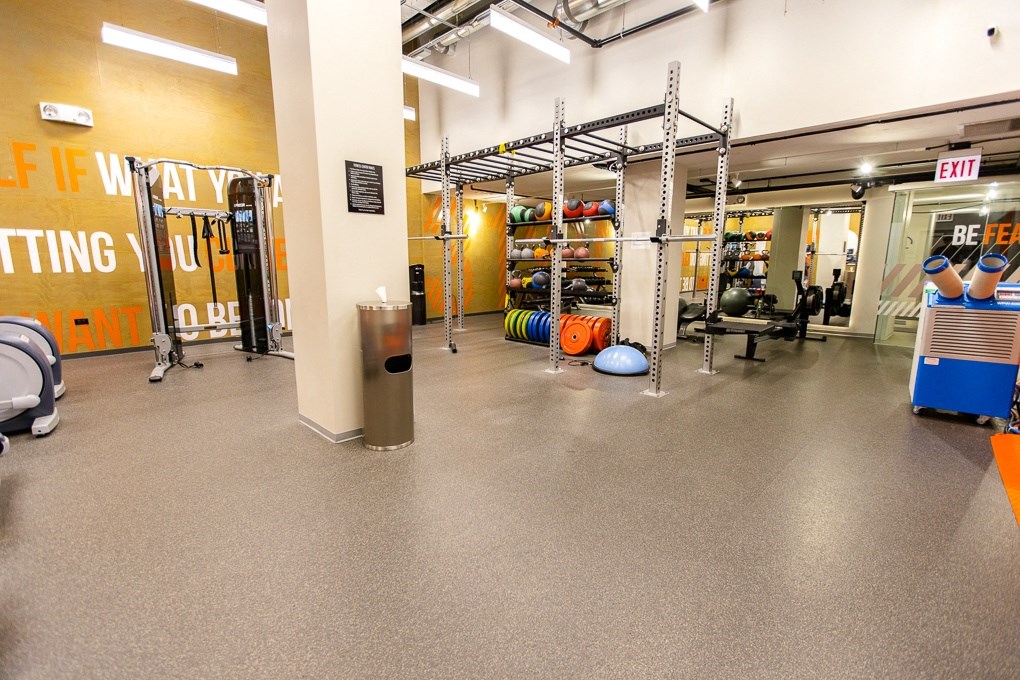 a workout room with weights and other equipment in a gym at The Kent, Illinois