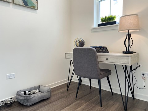 a bedroom with a desk and a chair at Enclave Crystal Lake, Illinois