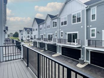 the view of a row of houses from a balcony at Enclave Crystal Lake Townhomes and Apartments, Crystal Lake, 60014
