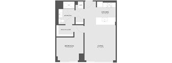 A floor plan of a small apartment with a kitchen, living room, and bathroom.