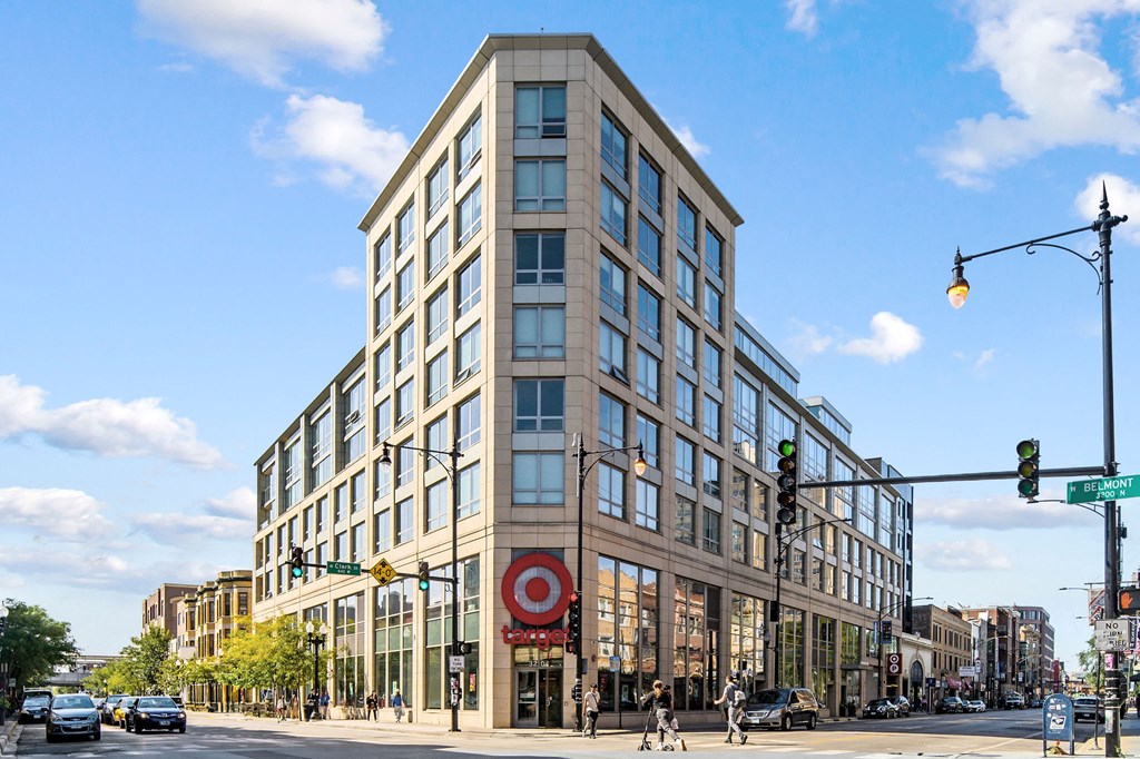 a tall building with many windows and a red target sign in front of it at Lakeview 3200 Apartments, Illinois