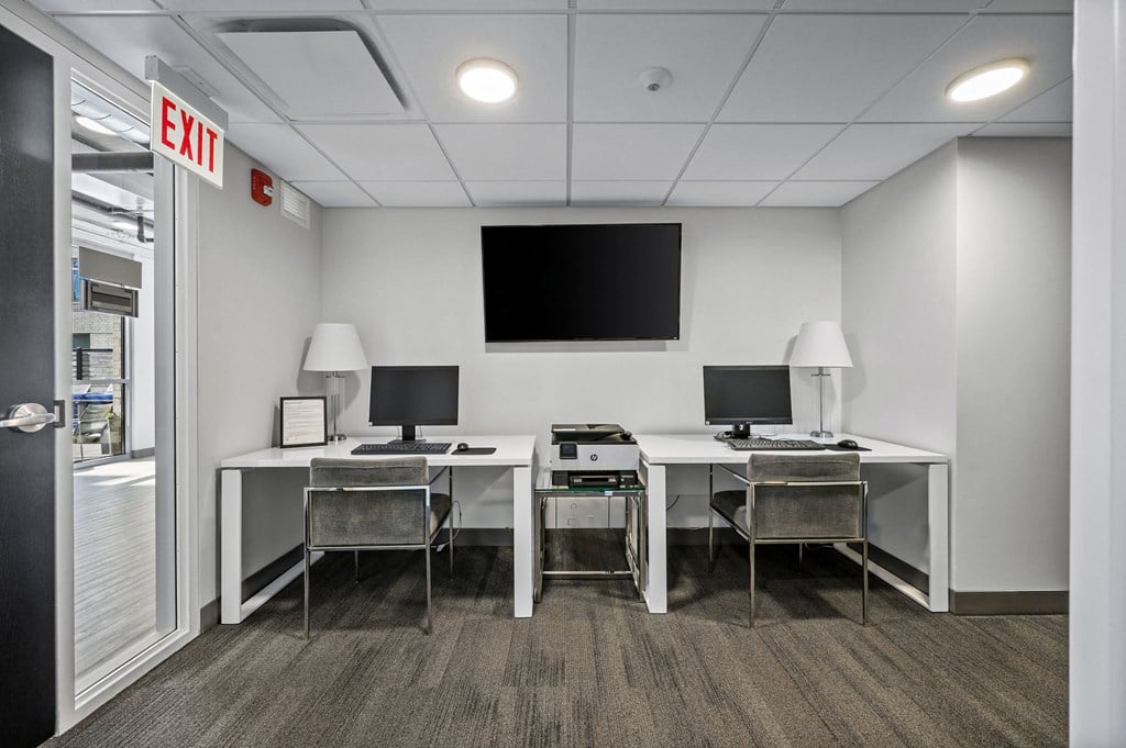 a room filled with furniture and a flat screen tv at Lakeview 3200 Apartments, Chicago, IL
