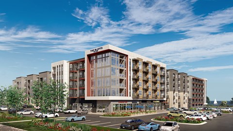 The Skyline is a modern apartment complex with a parking lot in front.
