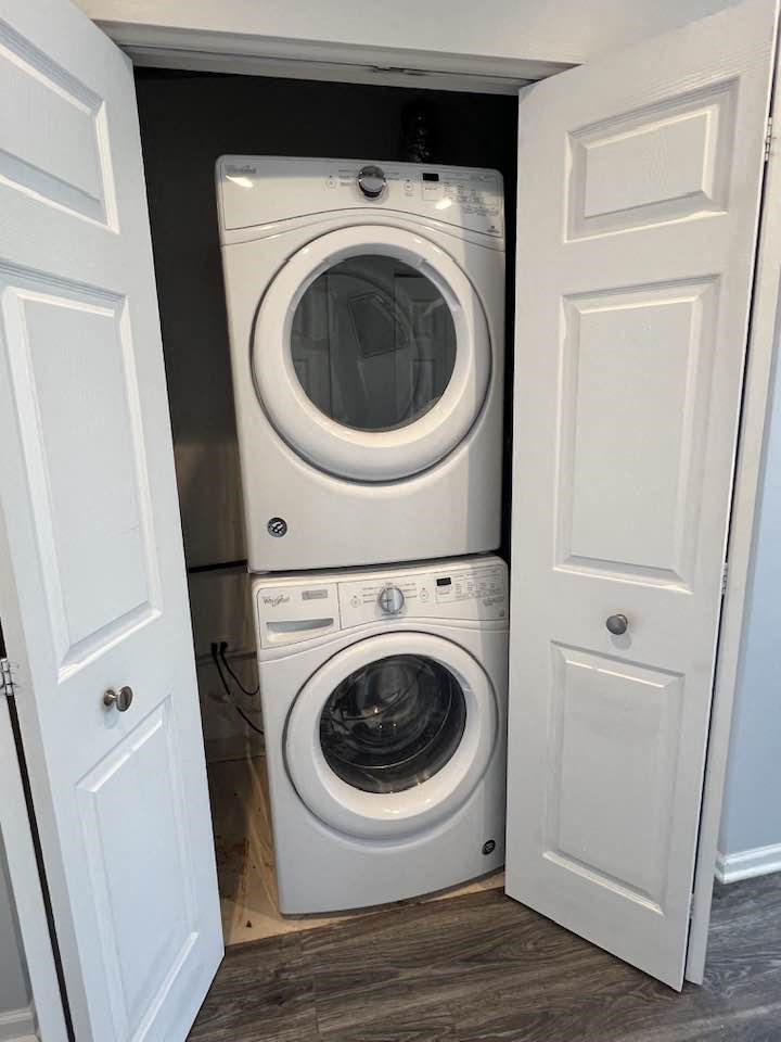 a washing machine and dryer in a closet