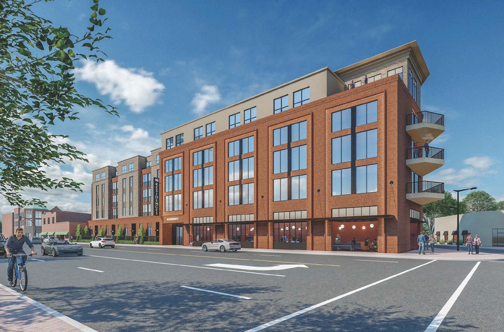 a rendering of a large brick building on a city street