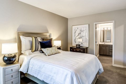 Bedroom with cozy bed and lamp at Apex 41, Lombard, IL, 60148