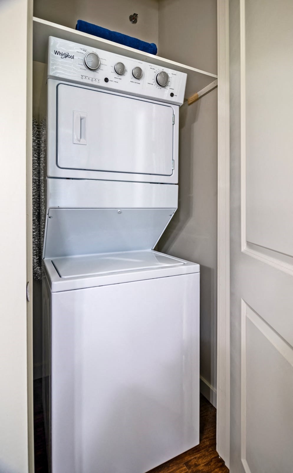 In-unit laundry in State Street Flats one bedroom apartment in Nashville. Unit is a stacked whirlpool washer and dryer in dedicated closet.
