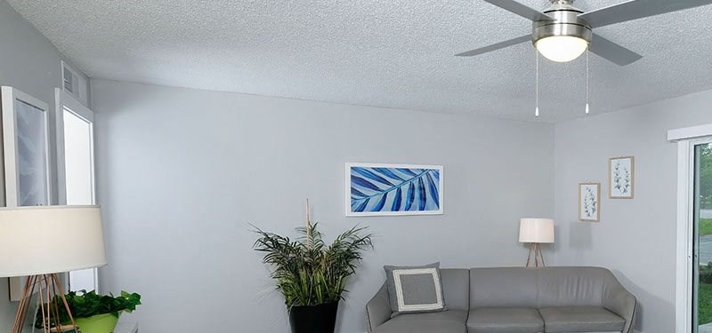 Mandarin Bay Apartments - Living Room Apartments in for Rent in Jacksonville - Modern Living Room With Stylish Decor, Hardwood Flooring, and Access to Outdoor Patio - Photo Gallery 3