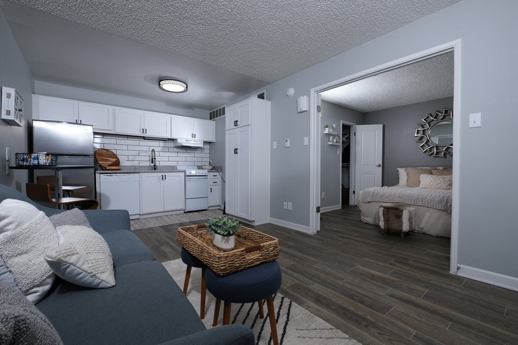 Fusion Fort Worth studio apartment in Haltom City interior with classic kitchen, open concept living area, and large bedroom.