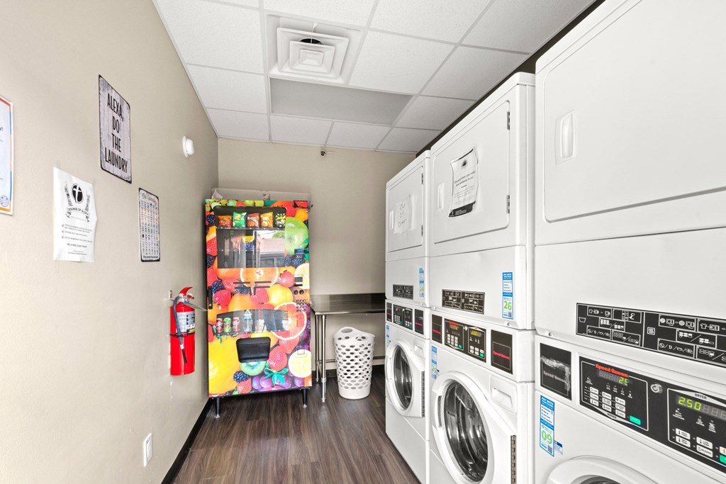 Retreat at Indian Lake Apartments Hendersonville TN laundry facility with a vending machine selling snacks.