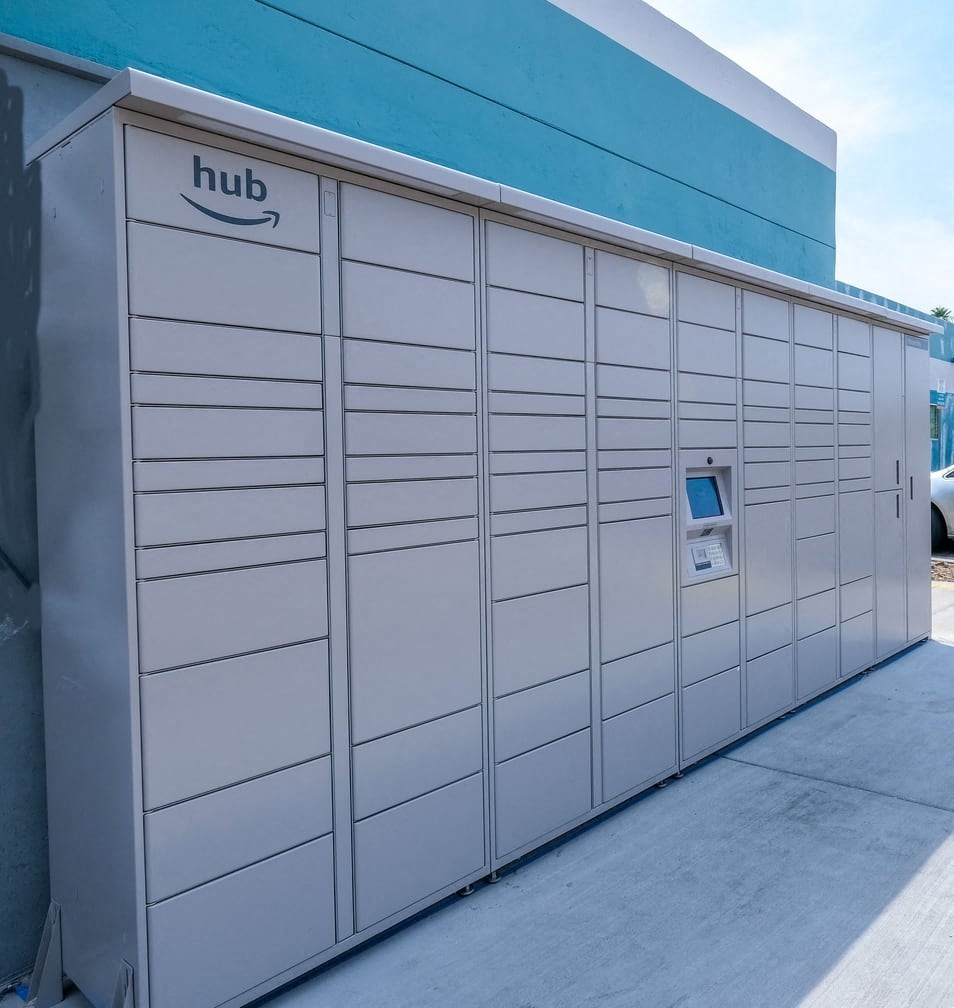 Fifteen 50 apartments Las Vegas amazon hub with screen and keypad in center in front of blue wooden plank wall