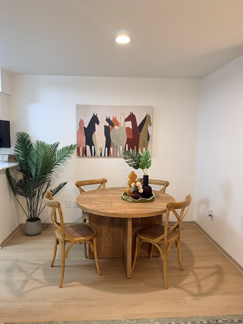 Fusion Crossroads dining room with a wooden table and chairs.