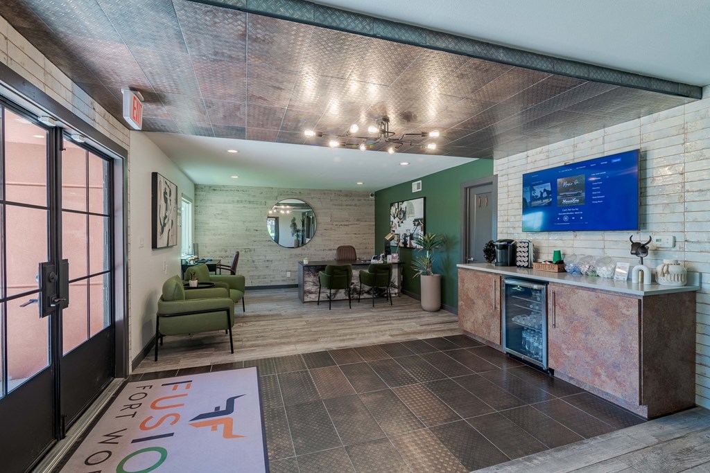 fusion fort worth leasing office interior with coffee bar and modern rustic decor