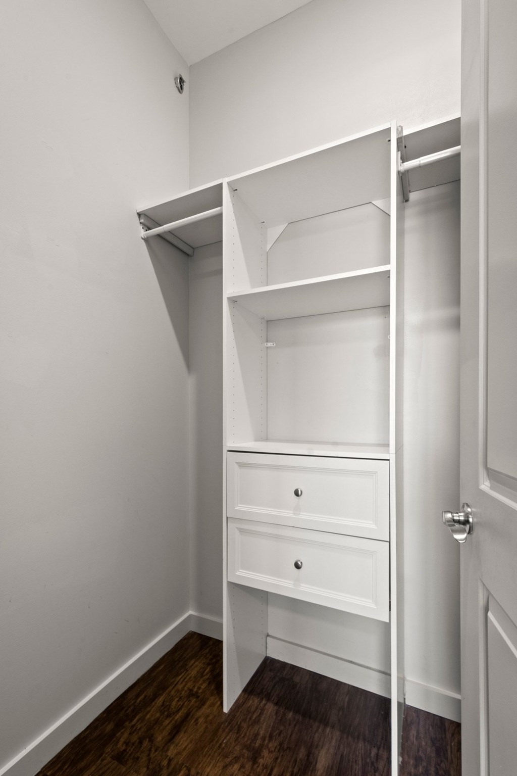 State Street Flats, city side flats Nashville, white closet with a drawer underneath the shelves.