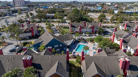 A bird's eye view of Fusion Orlando Apartments and a swimming pool.