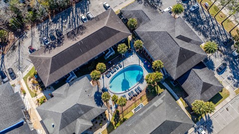 A bird's eye view of Mandarin Bay Apartments with a swimming pool.