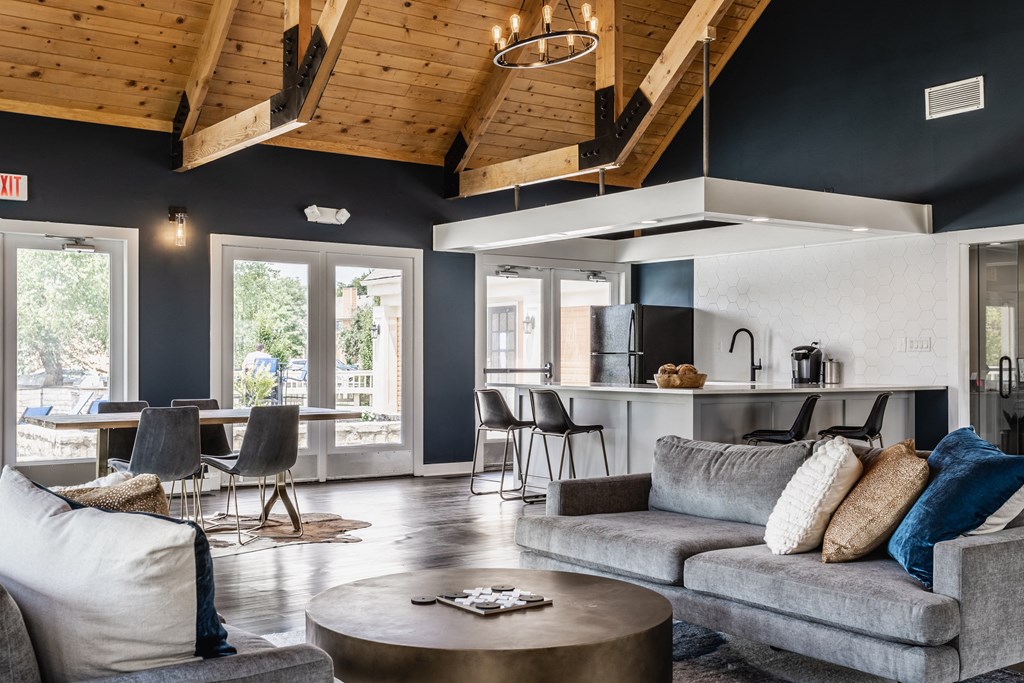 Fairway Lakes Apartments Westerville Ohio Gorgeous Clubhouse with Floor to Ceiling Window and full Kitchen. Plush Seating, stone fireplace, and gathering Area