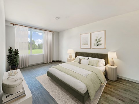 Altura Apartments large bedrooms featuring spacious closets, woodgrain flooring, and ample natural light from windows.