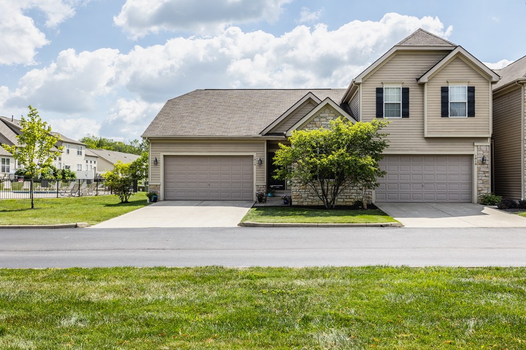a house with a two car garage
