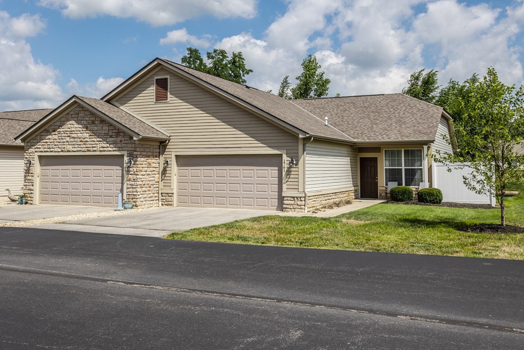 a house with two garage doors