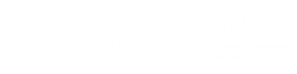 The image features the logo of the Ackermann Group, which includes a white triangle and the company name and motto.