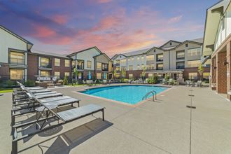 Austin Park Apartments Miamisburg Ohio Pet Friendly Sparkling Swimming Pool with Sundeck, Lounge Chairs, Fire pits, and Cabana