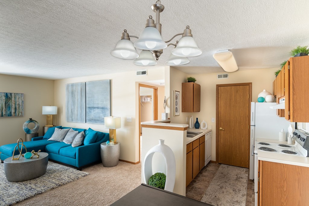 a kitchen and living room in a 555 waverly unit