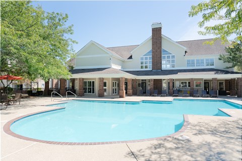 Sparkling swimming pool and sundeck at Britton Woods Apartments with updated community amenities