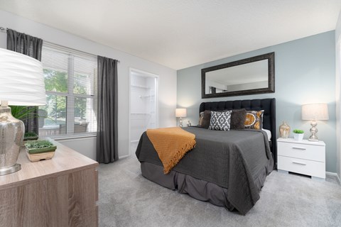 Spacious bedroom with a king-sized bed at Britton Woods Apartments in Dublin, Ohio