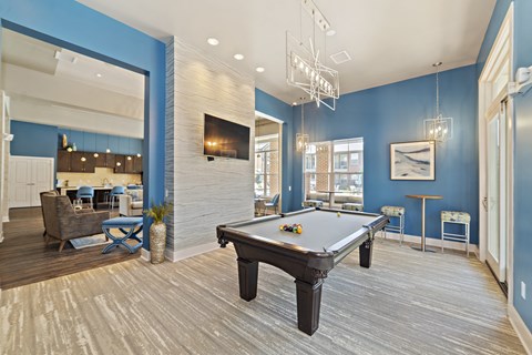 The game room in the renovated clubhouse includes a pool table for resident recreation.