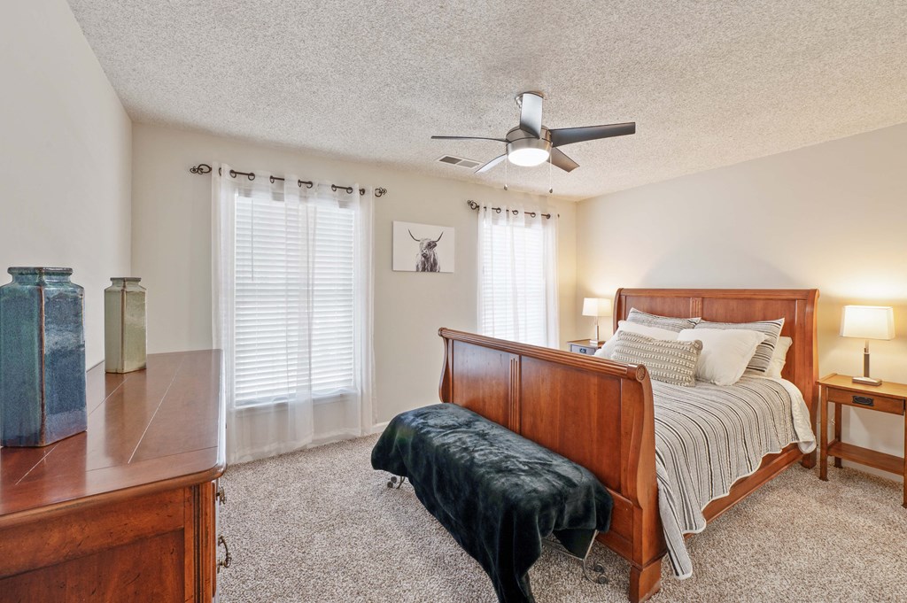 Hamburg, KY, Apartments - Reserve at Hamburg - Spacious Bedroom with a Ceiling Fan, Carpet Flooring, and Two Windows