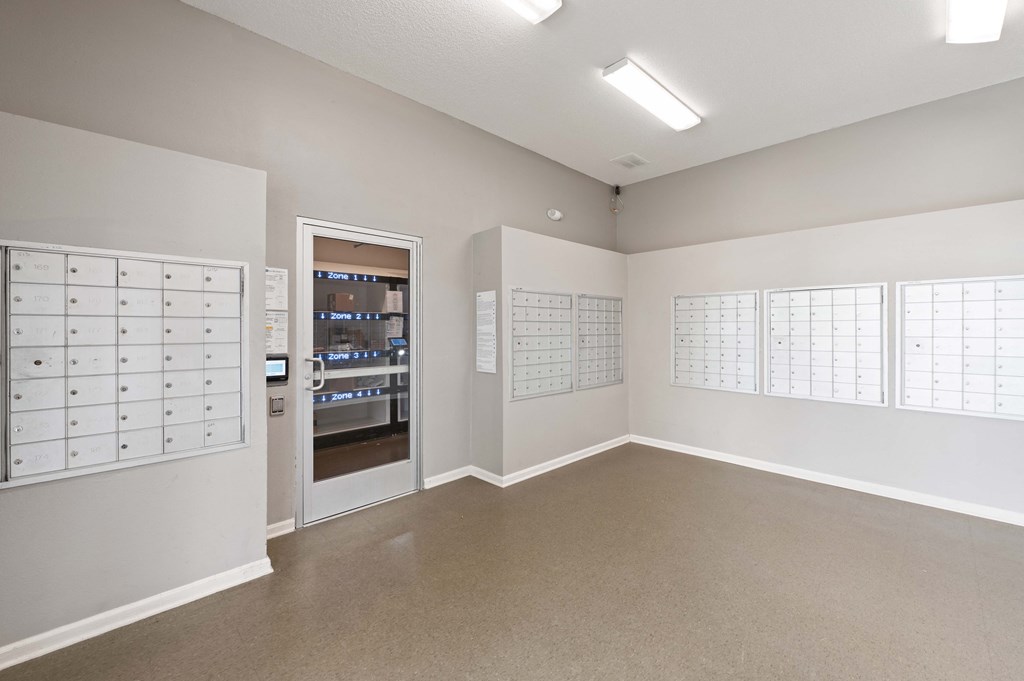 A mail room at Reserve at Hamburg with a selection of lockers in Hamburg, KY.