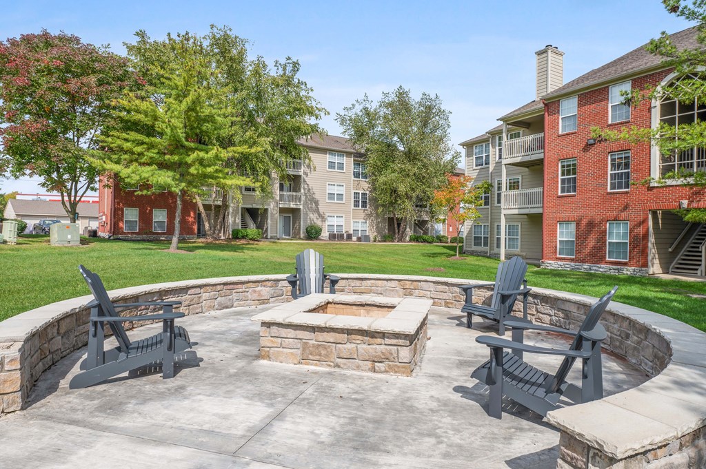 A firepit surrounded by four chairs at Reserve at Hamburg in Kentucky.