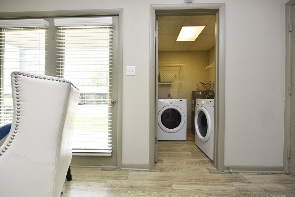 a laundry room with a washer and dryer