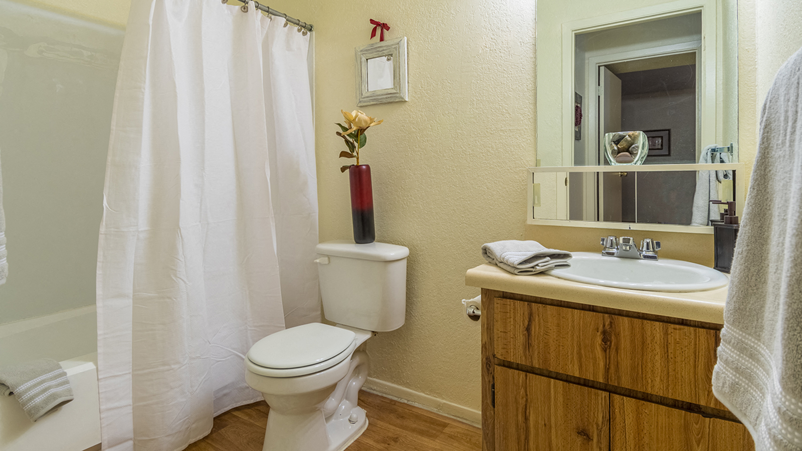 Somerpointe bathroom with vanity sink and large tub