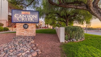Canyon creek community sign with lush landscape and well kept pathway - Photo Gallery 20