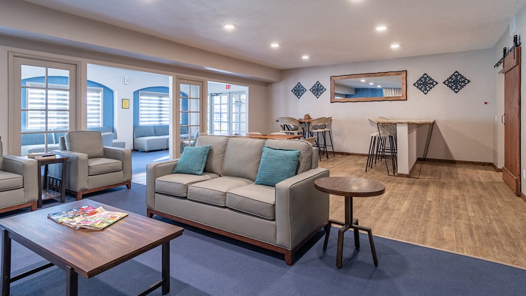 canyon oaks clubhouse with cozy couches and fireplace