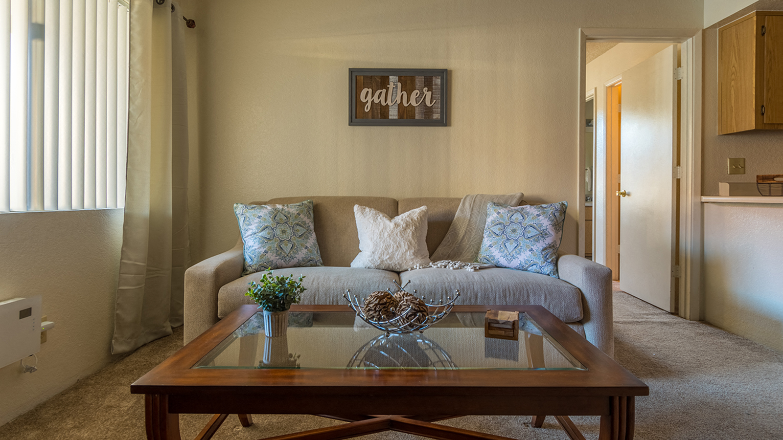 a living room with a couch and a coffee table