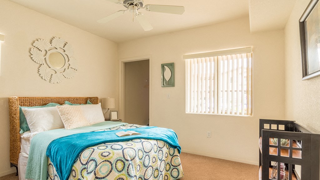 Desert Sands bedrooms with ceiling fans.