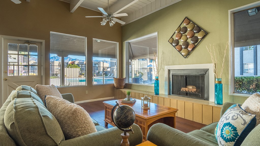 Riverstone clubhouse with plenty of lounging area and ceiling fans above