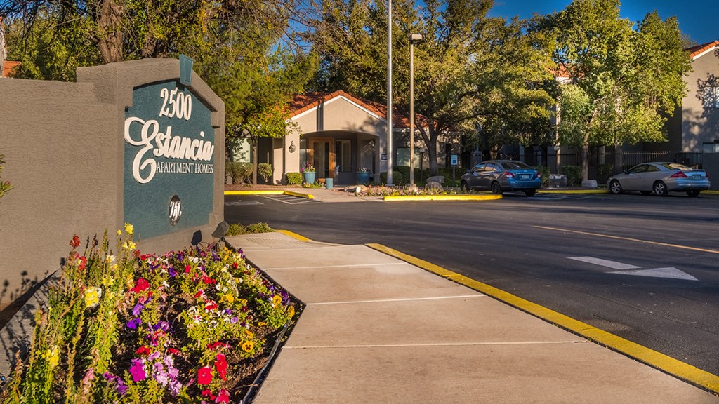 Estancia community sign with nice greens and well kept pathway