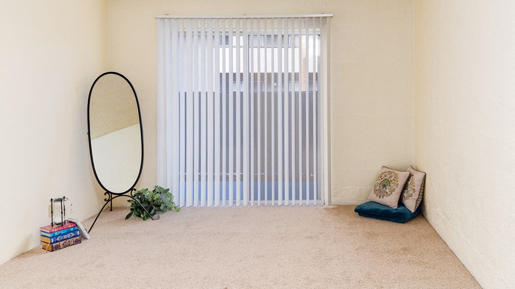 Cottonwood Creek large bedroom with back sliding window.