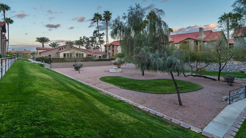 Enclave courtyard view with lush landscape