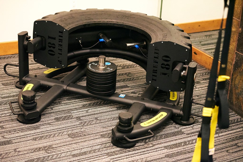 a small mechanical device with a wheel and axle on the floor