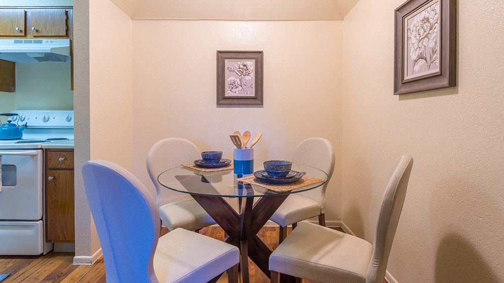 Enclave dining area with table an nice décor