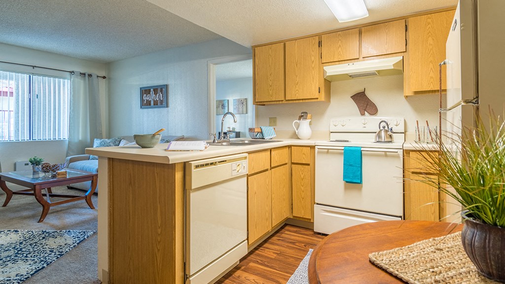 Canyon creek spacious kitchen with plenty of cabinetry, a fridge, and a stove