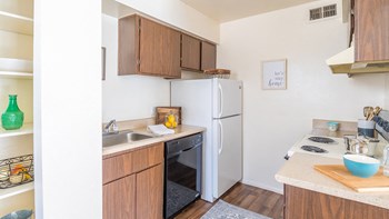 The Springs spacious kitchen with plenty of cabinetry and matching appliances - Photo Gallery 6