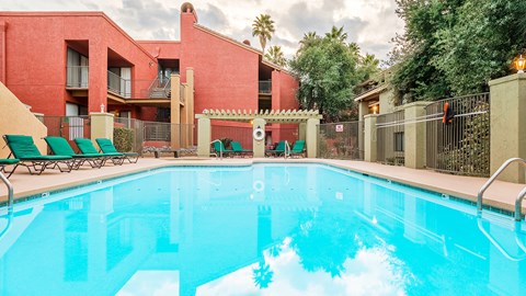 Front view resort style pool with ramada in background