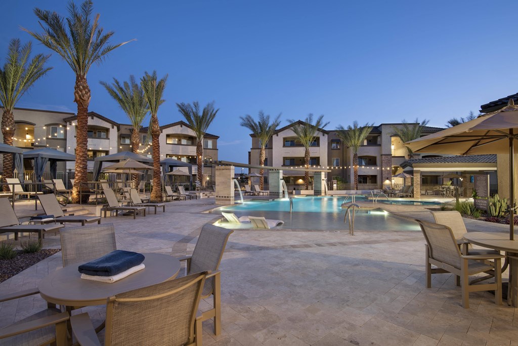 a swimming pool at night at the resort at pedregal